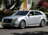 A three-quarter front view of a silver Cadillac CTS Sport Wagon