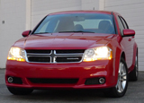 A front view of a red 2012 Dodge Avenger SXT Plus A front view of a red 2012 Dodge Avenger SXT Plus