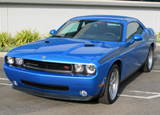 A three-quarter front view of a blue 2009 Dodge Challenger R/T