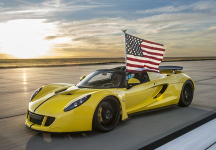 A three-quarter front view of a yellow Hennessey Venom GT