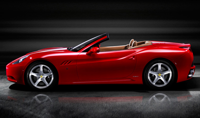A side view of a red 2011 Ferrari California