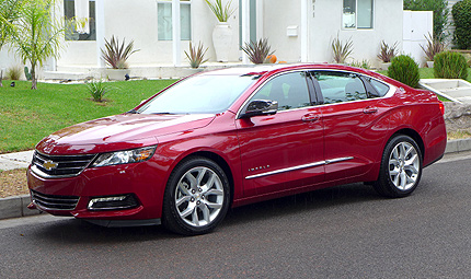 A three-quarter front view of a 2014 Chevrolet Impala, previously featured as one of GAYOT's Top 10 Value Cars