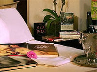 The Erotica Package at the Library Hotel in New York City includes erotic literature, roses, Prosecco sparkling Italian wine, chocolates, strawberries and whipped cream