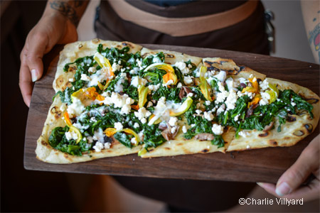 Try the wood-grilled squash blossom flatbread at The Advocate in Berkeley