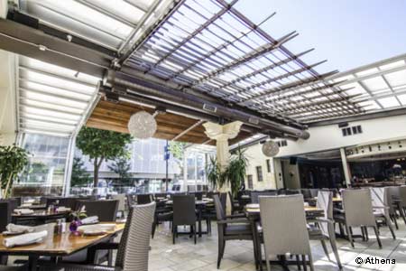 Skyline views and an attractive patio accompany traditional Greek fare at this taverna staple.