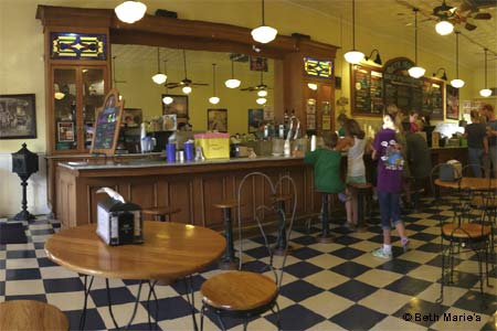 Old-timey ice cream parlor with malts, shakes and sundaes captures soda fountain experience in the heart of Denton Square.