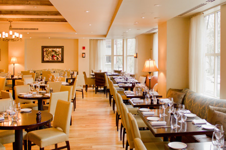 Bistro du Midi complements its French cuisine with a striking view of the Public Garden.