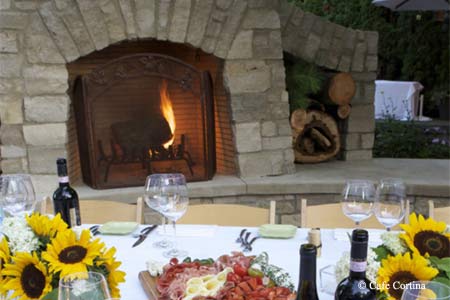A fireside table and romantic touches elevate this Italian restaurant to out-of-the-ordinary status.