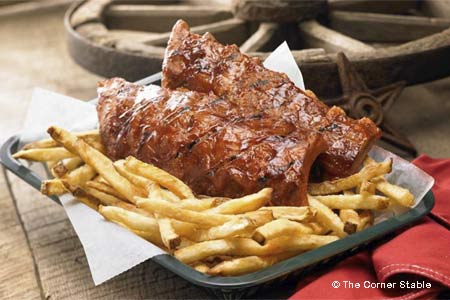 The Corner Stable is justly renowned for its slow-roasted baby-back ribs.