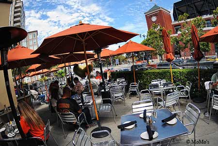 Across the street from the ballpark, post-game patrons descend on this restaurant's patio and bar for cocktails and modern American fare.