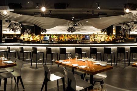 A River North scene that breaks the steakhouse mold by catering to women and showcasing a sleeker, modern design.