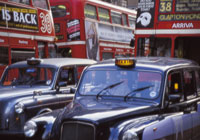 London's iconic black cabs and red buses London's iconic black cabs and red buses