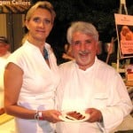 Chef Celestino Drago, from Drago, Santa Monica, CA, over a pork sausage with Sophie Gayot