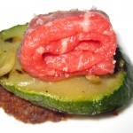 Bolognaise with grilled zucchini, beef carpaccio and black olive