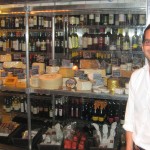 General manager Jason Berkowitz in front of the cheese display