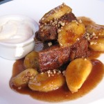 French toast bananas Foster with bourbon vanilla maple syrup, pecans and Chantilly cream