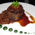 Braised shin of beef with red wine risotto, parsley purée and seared foie gras