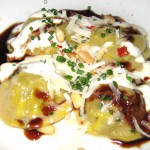 Braised beef lengua ravioli with spiced lebni, toasted pine nuts and dry chile