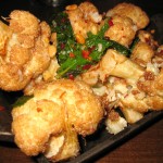 Caramelized cauliflower with pine nuts, chile flakes and mint