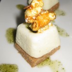 Goat cheese cheesecake with Mexican "root beer" sauce and caramel popcorn