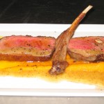 Lamb ribeye with orange & brown butter carrot puree, coriander jus, confit and pickled lamb tongue salad