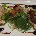 Salad of fresh matsutakes and duck confit, with seckel pear and chicory