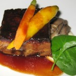 Braised veal breast with mushrooms, celery root purée, glazed baby carrots, haricots verts and veal jus