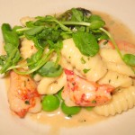 Lobster pasta with English peas, lobster cream and pancetta