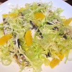 Grilled and marinated Monterey Bay sardines with navel orange, fennel, celery and frisée