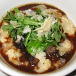 Braised beef cheek with risotto arborio, red wine sauce, arugula and parmesan cheese