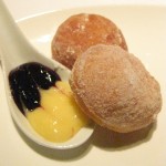 Zeppole al lemoni: Italian donuts cooked to order with meyer lemon curd and berry Earl Grey conserva