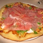 White pizza: prosciutto, burrata, arugula and truffle oil