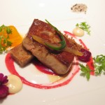 Seared Foie Gras with fuyu persimmon, parsnip cake, and cranberry reduction