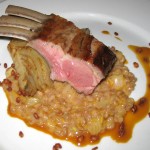 Oven-roasted lamb rack with sous-vide fennel, farro and orange demi