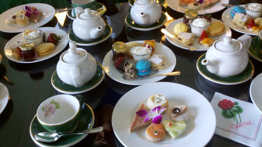 Sweet and savory snacks accompany tea service at the Grand Hotel