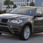 A three-quarter front view of the 2013 BMW X5