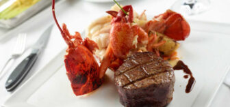 Charlie Palmer Steak’s Butter Poached Maine Lobster and Petite Filet Mignon
