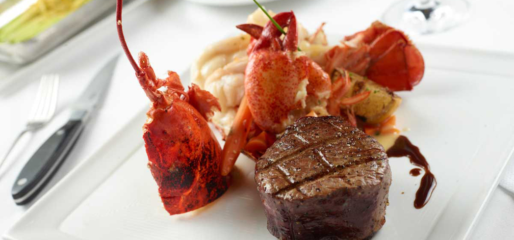 Charlie Palmer Steak’s Butter Poached Maine Lobster and Petite Filet Mignon