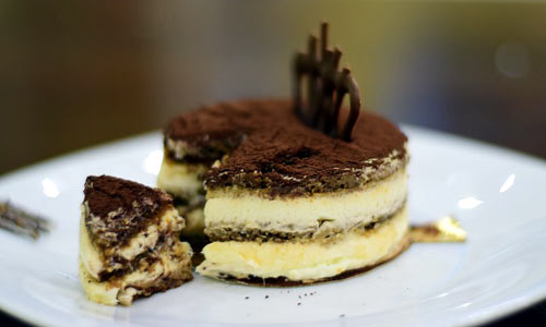 Tiramisu is a dessert of rum-spiked cake and triple-crème Mascarpone cheese